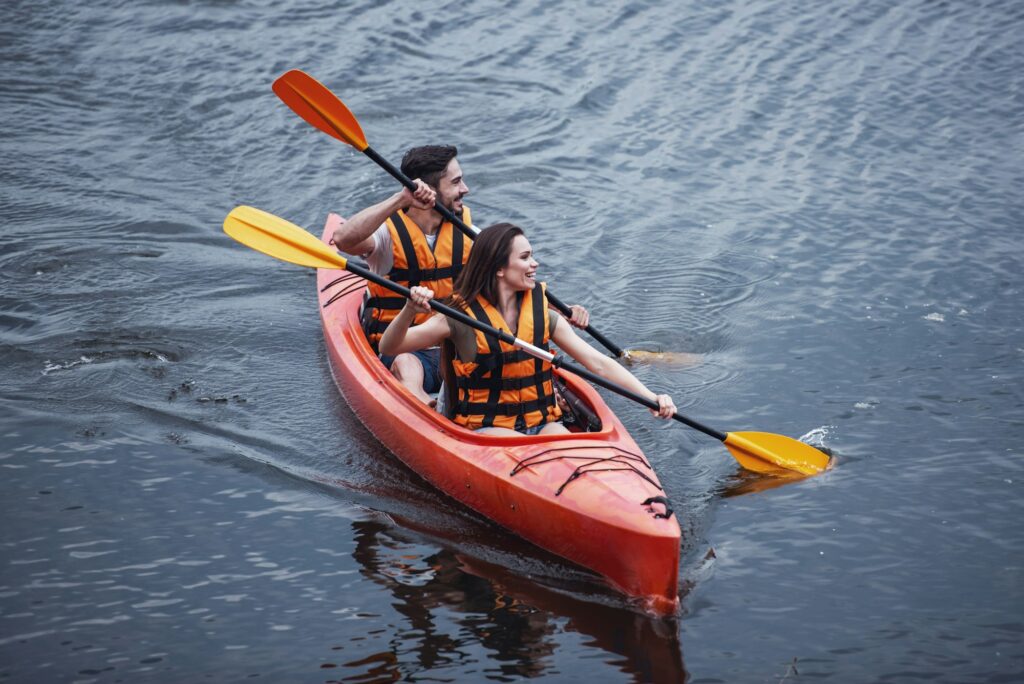 Couple travelling by kayak